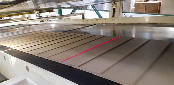 / contentassets / 169 bb78c00cd49eb9a5f6f359e0b6655 / corrugated-board-warp-measurement.jpg